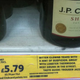 Image for article titled Performance Artists Swap Real Wine Labels for Infinitely Funnier Ones